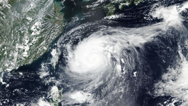 Вид из космоса на тайфун Майсак, проходящий над Японией - Sputnik Արմենիա