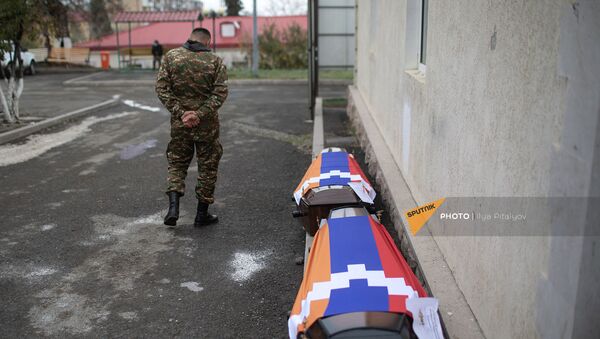 Гробы с телами двух погибших в Степанакерте братьев  - Sputnik Армения