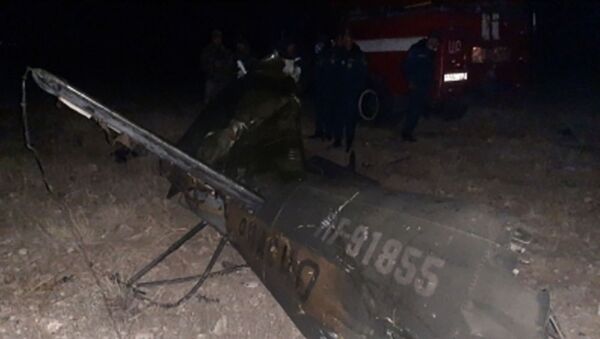 Обломки российского вертолета Ми-24, сбитого в воздушном пространстве над территорией Армении вне зоны боевых действий (9 ноября 2020). Араратская область - Sputnik Արմենիա