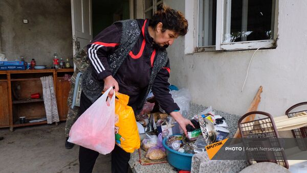 Жители села Угтасар Аскеранского района Карабаха покидают свои дома перед сдачей территорий азербайджанской стороне (19 ноября 2020). Карабах - Sputnik Արմենիա