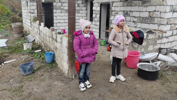 Жители села Нор Марага Мартакертского района Карабаха покидают свои дома перед сдачей территорий азербайджанской стороне (19 ноября 2020). Карабах - Sputnik Արմենիա