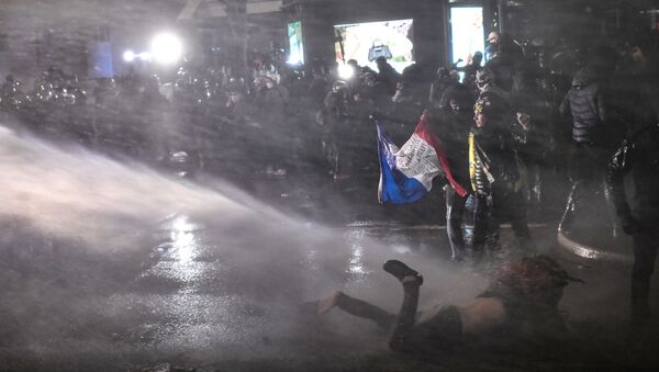 Полиция разгоняет протестующих во время демонстрации против законопроекта об общей безопасности (21 ноября 2020). Париж - Sputnik Армения