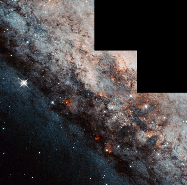 NGC 4945 գալարաձև գալակտիկան «հպվում է» Կենտավրոս համաստեղությանը NGC 4945 գալարաձև գալակտիկան «հպվում է» Կենտավրոս համաստեղությանը - Sputnik Արմենիա