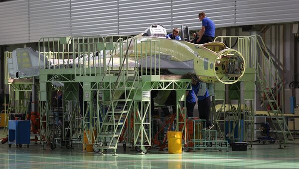 Сотрудники Российской самолетостроительной корпорации «МиГ» во время работы (14 июля 2017). Жуковский - Sputnik Армения