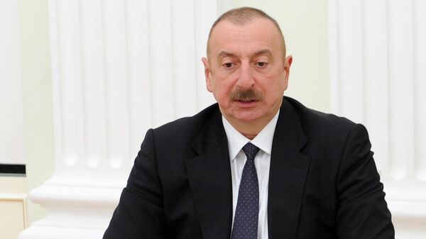 Президент Азербайджана Ильхам Алиев во время переговоров (11 января 2021). Москва - Sputnik Армения