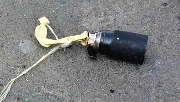 Кассетная бомба, обнаруженная рядом с головным офисом компании «Карабах Телеком» (16 марта 2021). Степанакерт - Sputnik Արմենիա