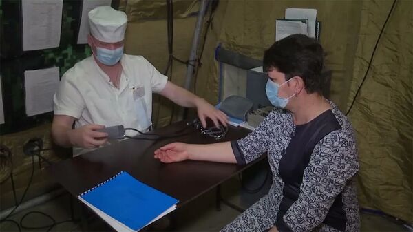 Оказание медпомощи жителям Нагорного Карабаха российскими военными медиками - Sputnik Армения