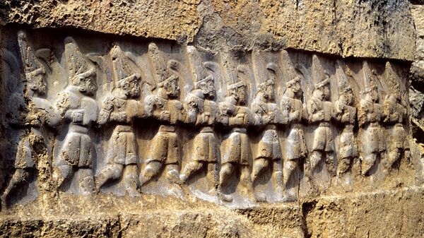Рельеф с изображением 12 богов подземного царства в хеттском святилище Язылыкая - Sputnik Արմենիա
