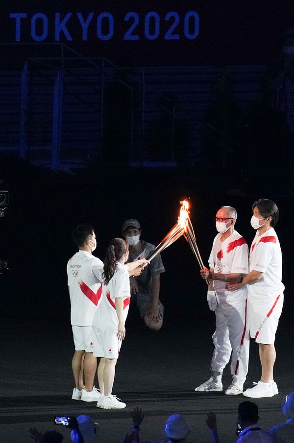 Օլիմպիական կրակի վառման արարողությունը՝ խաղերի բացման ժամանակ - Sputnik Արմենիա