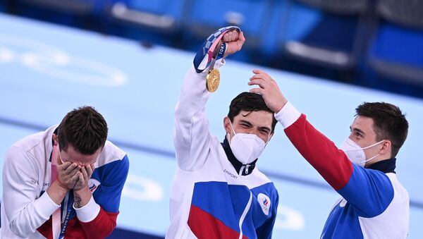 Давид Белявский, Артур Далалоян и Никита Нагорный (слева направо), завоевавшие золотые медали в командном многоборье среди мужчин на Олимпийских играх в Токио - Sputnik Արմենիա