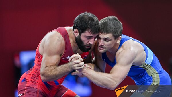 Поединок 1/4 финала по борьбе греко-римского стиля между Карапетом Чаляном (Армения) и Александром Чехиркиным (Россия) на XXXII летних Олимпийских играх (2 августа 2021). Токио - Sputnik Армения