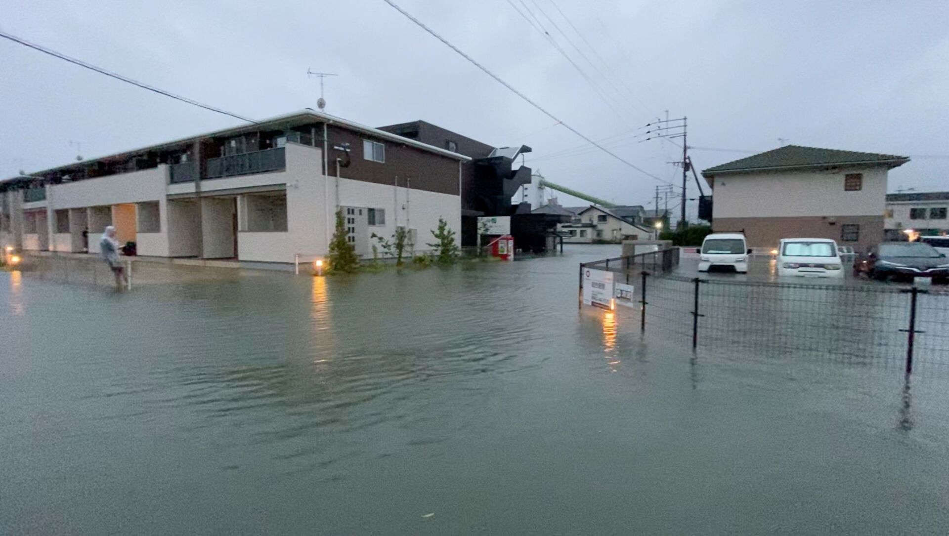 Затопленная улица во время сильного дождя в Куруме, префектура Фукуока (14 августа 2021). Япония - Sputnik Армения, 1920, 14.08.2021
