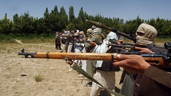 Боевики Талибана тренируются с оружием в Афганистане - Sputnik Армения