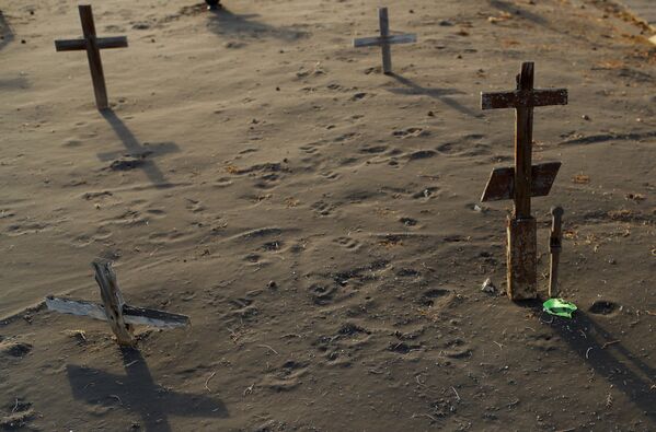 Մոխրի տակ թաղված Լոս Լյանոս դե Արիդան գերեզմանատունը Լա Պալմայում - Sputnik Արմենիա