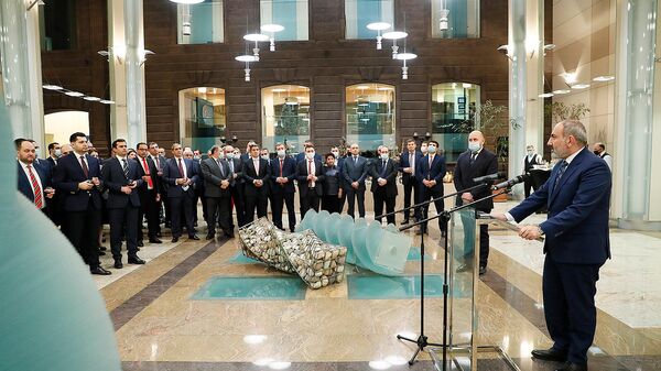 Премьер-министр Никол Пашинян принял участие в новогоднем приеме в Центральном банке (27 декабря 2021). Ереван - Sputnik Армения
