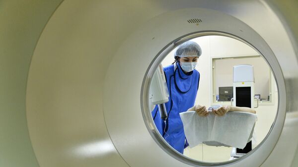 Обследование пациента с использованием позитронно-эмиссионного томографа (ПЭТ)  - Sputnik Армения