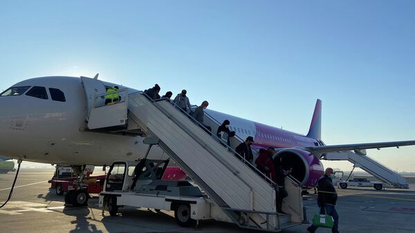 Первый рейс нового маршрута Абу-Даби - Ереван - Абу-Даби, запущенного авиакомпанией Wizz Air Abu Dhabi (7 февраля 2022). Еревaн - Sputnik Армения