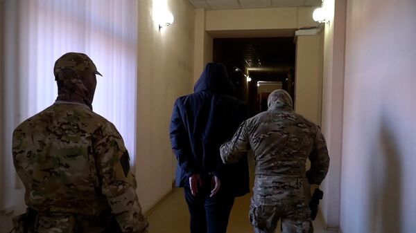 Задержание жителя Хабаровска, подозреваемого в госизмене. Кадры ФСБ - Sputnik Армения