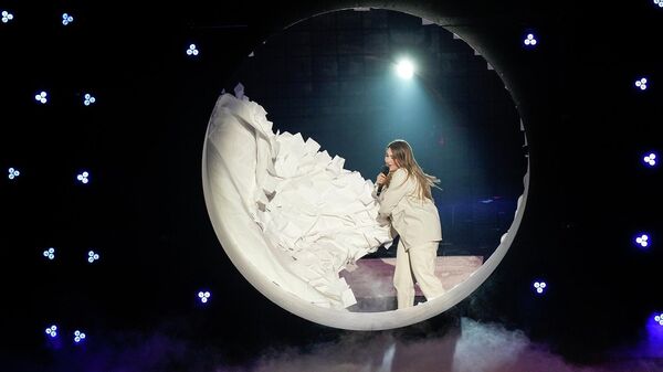 Роза Линн исполняет песню  Snap во время первого полуфинала конкурса песни Евровидение в Турине (10 мая 2022). Италия - Sputnik Армения