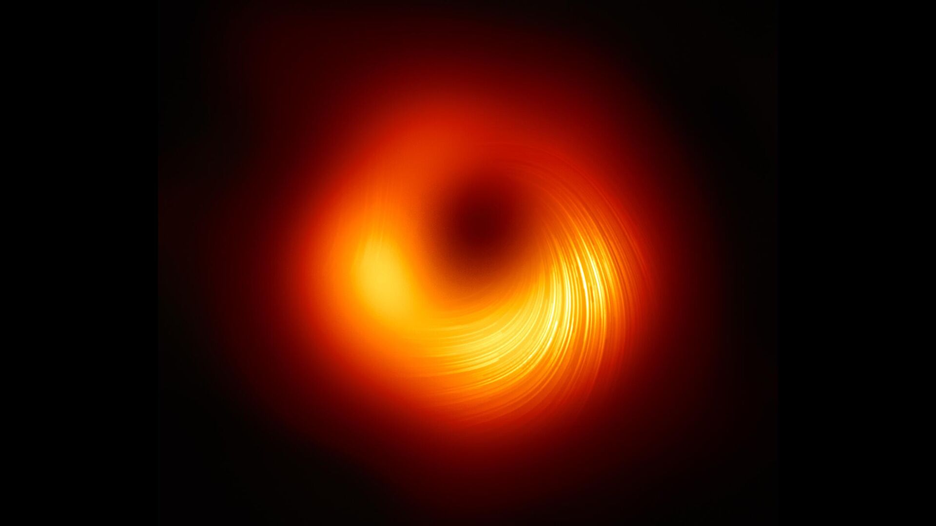 Вид на сверхмассивную черную дыру M87 в поляризованном свете - Sputnik Армения, 1920, 31.08.2023