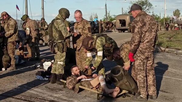 Скриншот с видео сдачи в плен украинских военных с Азовстали (17 мая 2022). Мариуполь - Sputnik Армения