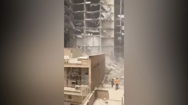  Иране обрушилось десятиэтажное офисное здание. Видео публикуют в соцсетях - Sputnik Армения