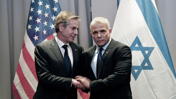 Госсекретарь США Энтони Блинкен на встрече с министром иностранных дел Израиля Яиром Лапидом (7 марта 2022). Рига - Sputnik Армения
