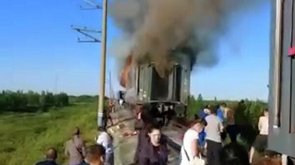 Кадры пожара вагона пассажирского поезда, шедшего по маршруту Новый Уренгой – Оренбург - Sputnik Армения