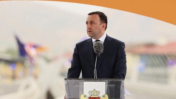 Премьер-министр Грузии Ираклий Гарибашвили на официальной церемонии открытия Моста Дружбы (19 августа 2022). Грузия - Sputnik Армения