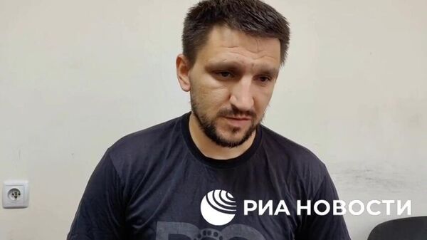 Видео РИА Новости. Задержанные в Энергодаре наводчики рассказали РИА Новости, что передавали координаты объектов у ЗАЭС - Sputnik Армения