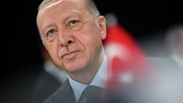 Президент Турции Реджеп Тайип Эрдоган во время саммита НАТО в конгресс-центре Ifema (30 июня 2022). Мадрид - Sputnik Армения