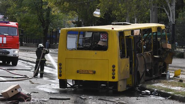 Автобус, уничтоженный в результате обстрела со стороны ВСУ, в Ворошиловском районе Донецка (22 сентября 2022). ДНР - Sputnik Армения
