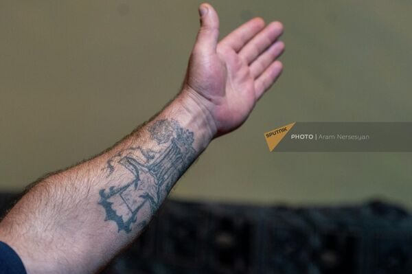 Татуировка на руке Андрея Шелемы - Sputnik Армения