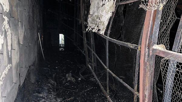 Разрушения, вызванные пожаром внутри здания тюрьмы Эвин на северо-западе Тегерана (16 октября 2022). Иран - Sputnik Армения