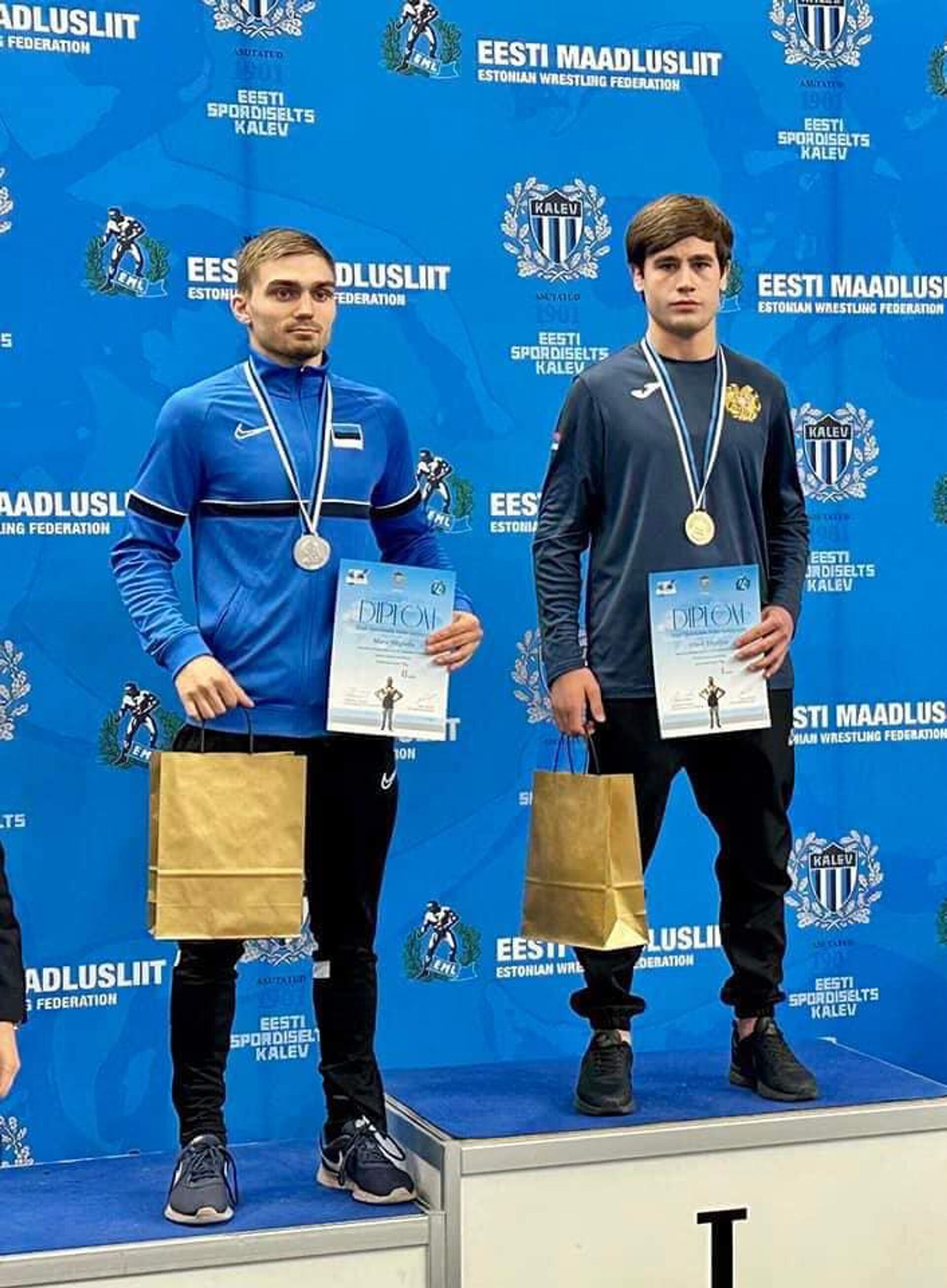 Победители на пьедестале почета чемпионата по борьбе имени Кристиана Палусалу в Талине Победители на пьедестале почета чемпионата по борьбе имени Кристиана Палусалу в Талине - Sputnik Արմենիա, 1920, 09.11.2022