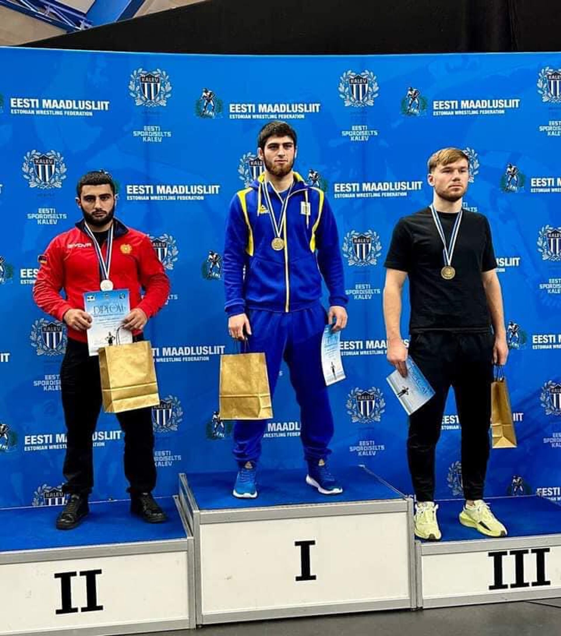 Победители на пьедестале почета чемпионата по борьбе имени Кристиана Палусалу в Талине Победители на пьедестале почета чемпионата по борьбе имени Кристиана Палусалу в Талине - Sputnik Արմենիա, 1920, 09.11.2022
