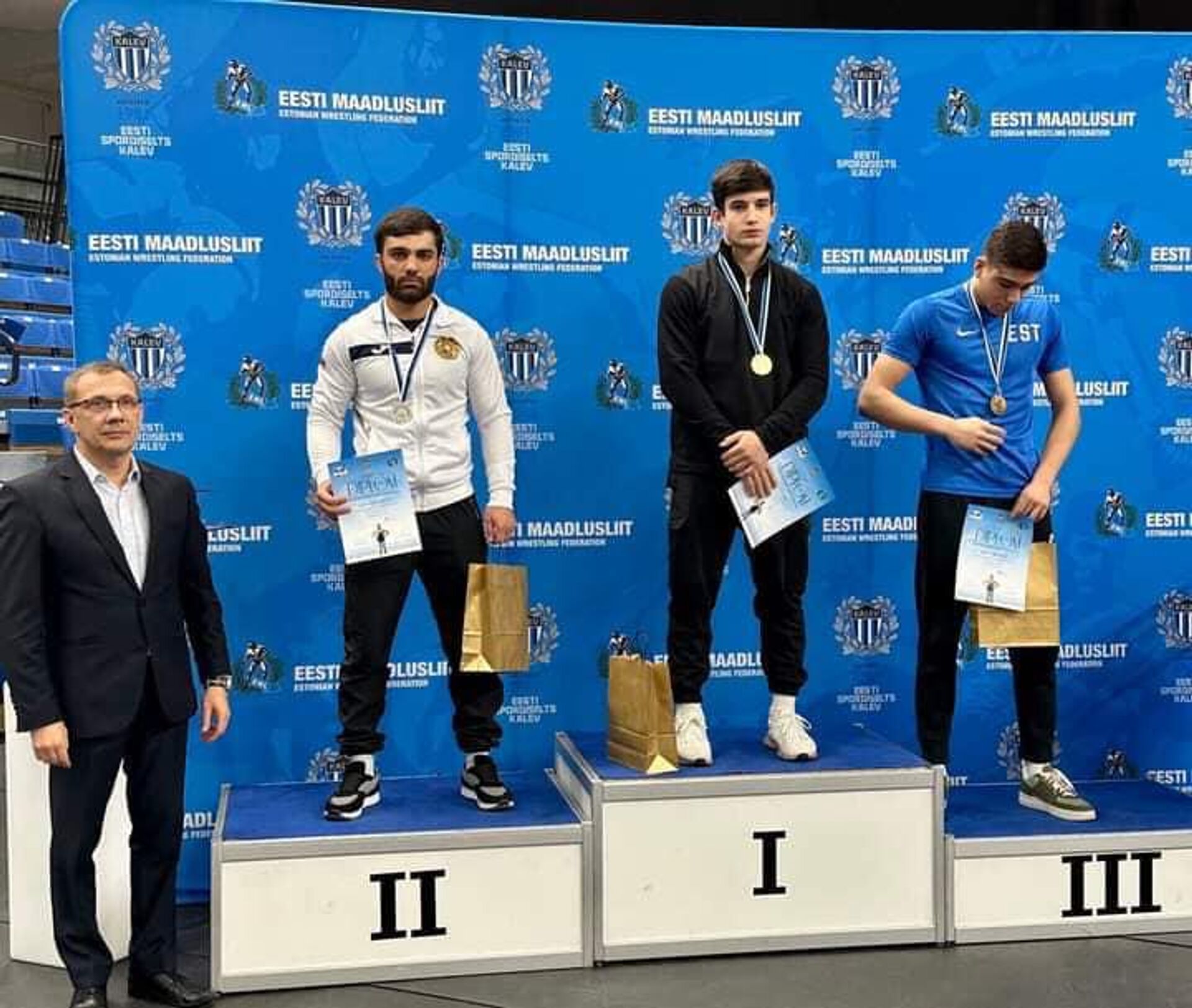 Победители на пьедестале почета чемпионата по борьбе имени Кристиана Палусалу в Талине Победители на пьедестале почета чемпионата по борьбе имени Кристиана Палусалу в Талине - Sputnik Արմենիա, 1920, 09.11.2022