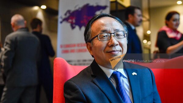 Чрезвычайный и полномочный посол Китая Фань Юн на IV Евразийской конференции по исследованию современного Китая и Евразии (2 декабря 2022). Еревaн - Sputnik Армения