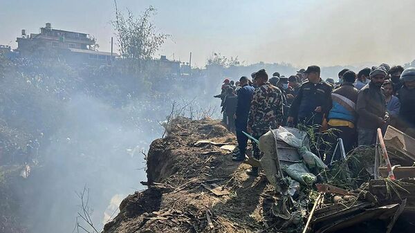 Спасатели на месте авиакатастрофы в Покхаре (15 января 2023). Непал - Sputnik Армения