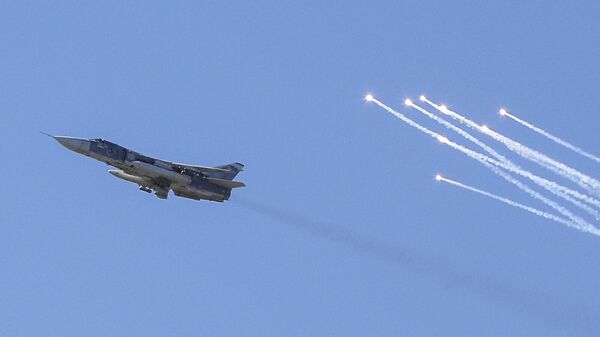 Фронтовой бомбардировщик Су-24 во время учений Вооруженных сил Украины. Архивная фотография - Sputnik Армения