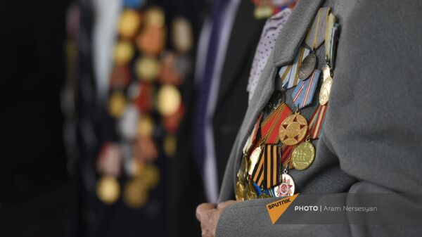 Медали одного из ветеранов ВОВ на показе документального фильма Следы Победы в кинотеатре Москва (8 мая 2023). Еревaн - Sputnik Армения