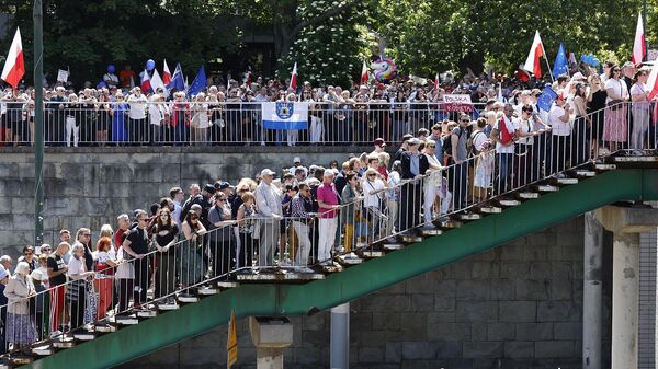 Люди на антиправительственной демонстрации, организованной оппозицией (4 июня 2023). Варшава - Sputnik Армения