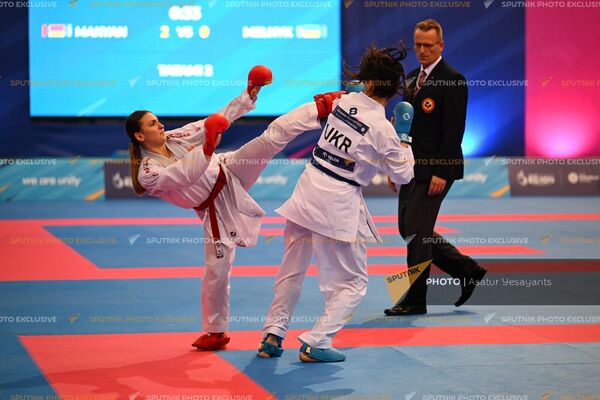 Анита Макян во время поединка по кумитэ-карате с украинской спортсменкой на III Европейских Летних Играх (23 июня 2023). Краков - Sputnik Армения