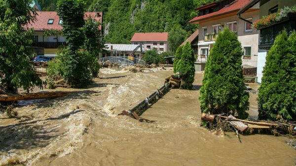 Наводнение в Црна-на-Короскем, вызванное аномальными погодными явлениями и изменением климата (6 августа 2023). Словения - Sputnik Армения