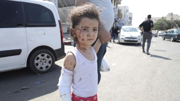 Գազայի հատվածում Իսրայելի զինված ուժերի հրթիռային հարվածների հետևանքով տուժած երեխա - Sputnik Արմենիա