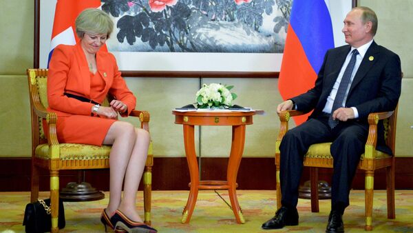 Президент РФ Владимир Путин и премьер-министр Великобритании Тереза Мэй во время встречи в рамках саммита Группы двадцати G20 (4 сентября 2016). Ханчжоу, Китай - Sputnik Армения