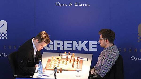 Матч 6-го тура шахматного турнира GRENKE Chess Classic между Магнусом Карлсеном и Левоном Ароняном (5 апреля 2018). Баден-Баден, Германия - Sputnik Արմենիա