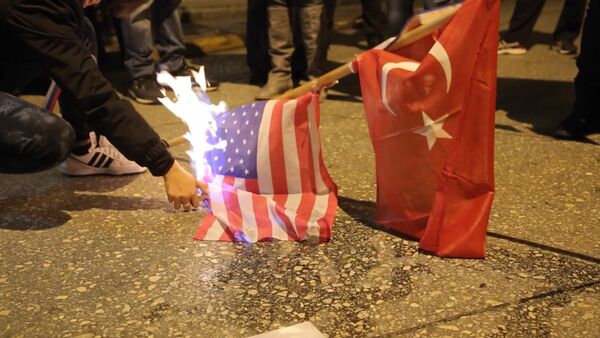 СПУТНИК_Греки сожгли флаги США и Турции в знак протеста против обстрела Су-24 - Sputnik Армения