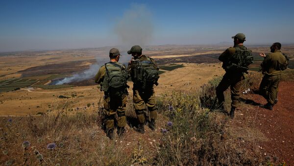 Израильские солдаты на военной базе в аннексированных Израилем сирийских Голанских высотах (7 июля 2018). - Sputnik Армения