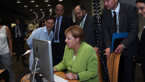 Канцлер Германии Ангела Меркель посетила центр креативных технологий Тумо (24 августа 2018). Еревaн - Sputnik Армения